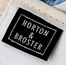 Digitally Printed Aprons - Frequently Asked Questions. Brand labels on digitally printed Aprons.